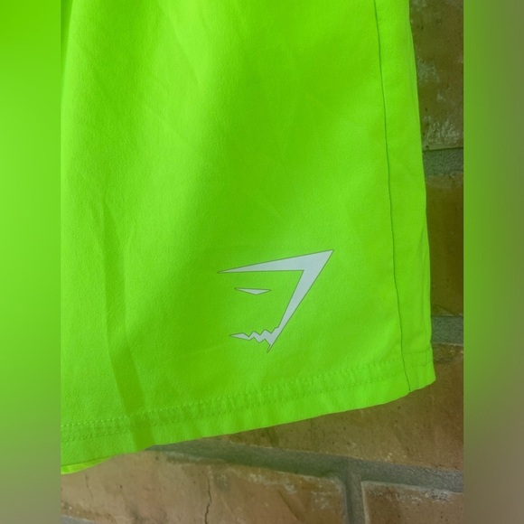 Gymshark Lightweight Neon Green Shorts 7” with zippered pockets, Size Medium - Picture 2 of 10